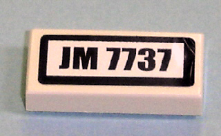3069pb0106 - Tile 1 x 2 with 'JM 7737' Pattern (Sticker) - Set 7737