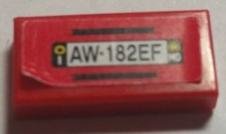 3069pb0424 - Tile 1 x 2 with Black Lines and 'AW 182EF' on Red Background Pattern (Sticker) - Sets 8153 / 8155