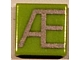3070pb037 - Tile 1 x 1 with Silver Capital Letter Æ Pattern