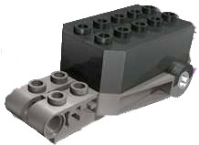32283c03 - Pullback Motor 9 x 4 x 2 1/3 with Dark Gray Base, White Axle Holes, Studs on Front Top Surface