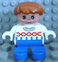 6453pb018 - Duplo Figure, Child Type 2 Boy, Blue Legs, White Sweater with Chain Pattern, Dark Orange Hair