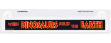 103490 - Plastic Rectangle with Red and Yellow 'WHEN DINOSAURS RULED THE EARTH' on Black Background Pattern