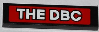 2431pb0305 - Tile 1 x 4 with White 'THE DBC' on Red Background Pattern (Sticker) - Set 76005
