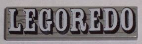 2431px11 - Tile 1 x 4 with Black and White 'LEGOREDO' on Wood Grain Pattern