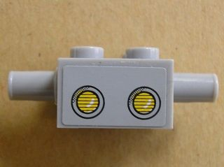 30000pb01 - Brick, Modified 2 x 2 with Pins and Axle Hole and Headlights Pattern (Sticker) - Set 3831