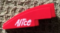 50950pb110L - Slope, Curved 3 x 1 with White 'Alice' on Red Background Pattern Model Left Side (Sticker) - Set 8142-2