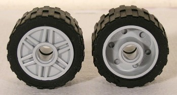 55981c01 - Wheel 18mm D. x 14mm with Pin Hole, Fake Bolts and Shallow Spokes with Black Tire 24 x 14 Shallow Tread (55981 / 30648)