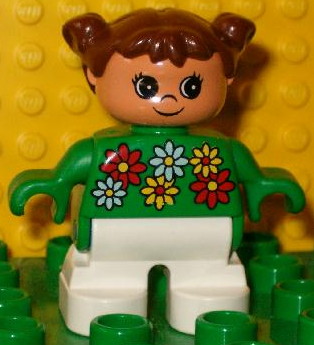 6453pb026 - Duplo Figure, Child Type 2 Girl, White Legs, White, Red and Yellow Flowers, Brown Hair