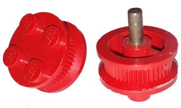 7039c - Wheel with 4 Studs and Metal Axle - Inner Side Supports, Traction Teeth