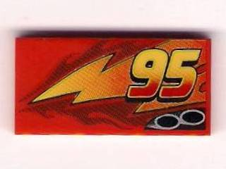 87079pb0031L - Tile 2 x 4 with Lightning, Exhaust Pipes and Offset '95' Pattern Model Left Side
