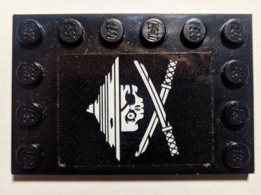 6180pb126L - Tile, Modified 4 x 6 with Studs on Edges with White Ninja Skull and Crossed Swords on Black Background Pattern Model Left Side (Sticker) - Set 70605